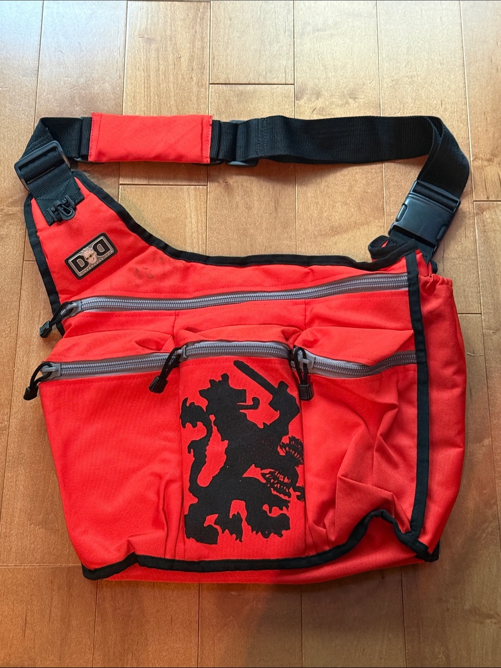 Diaper Dude cross body diaper bag with changing pad.
